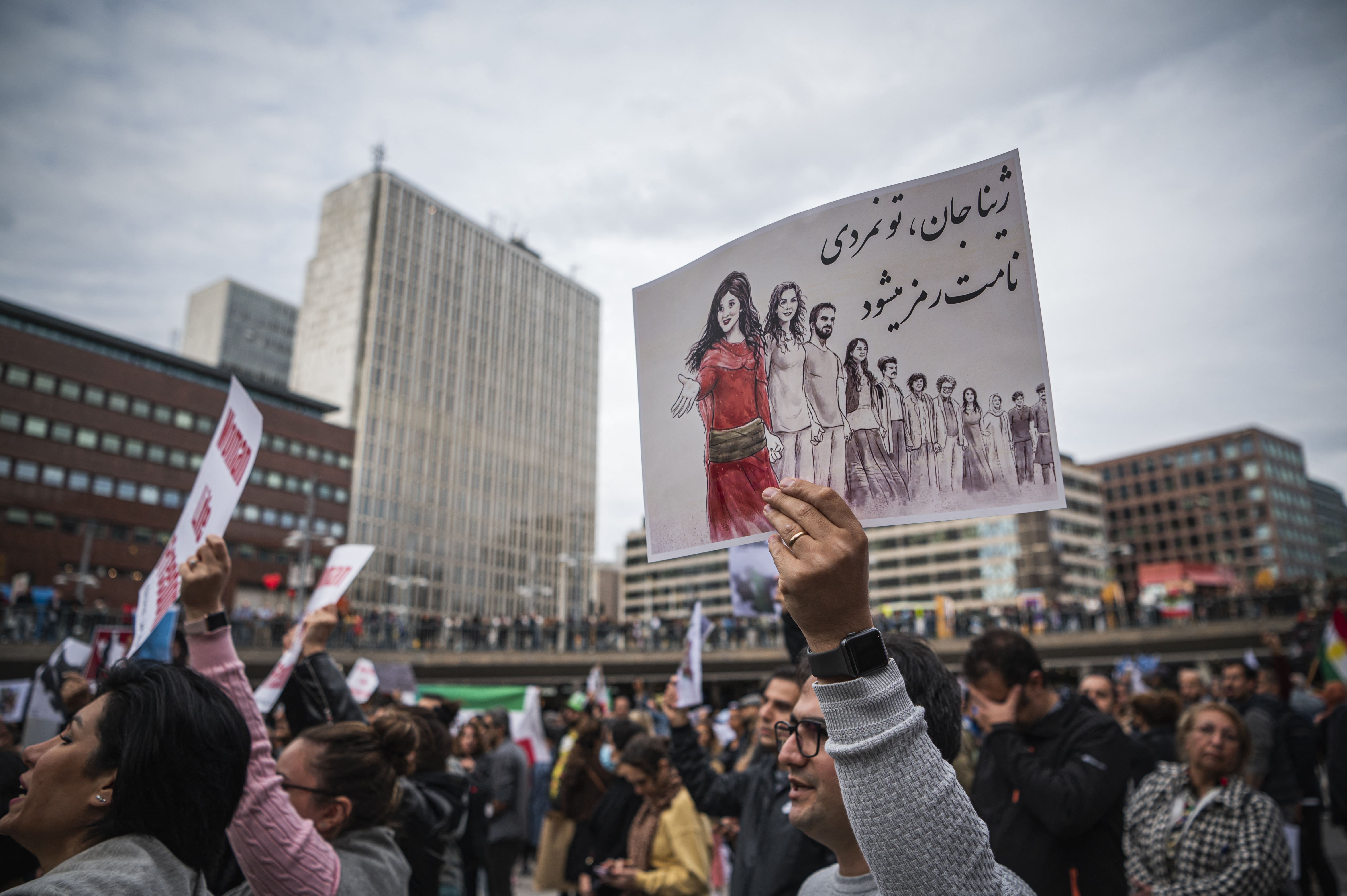 People protest in Sergels Torg in Stockholm, Sweden on September 24, 2022. Photo: Jonathan Nackstrand/AFP